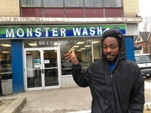 Sheldon in Parkdale in front of Monster Wash, coin laundry business, economic recession