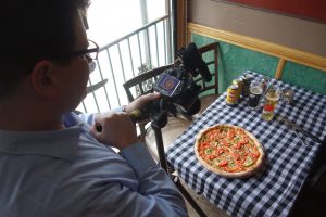 Markus from Dina Palace shoots Amico's perfect pizza p[ies